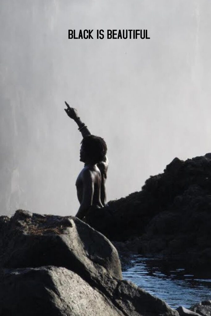 Black Is Beautiful Protest Poster With Black Man Raising Finger In Air In Front Of Rocks