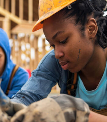 Volunteers building a home